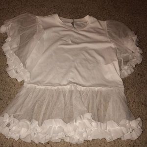 White ruffle shirt